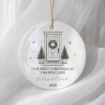 Our First Christmas ornament with a line drawing of a front door and wreath and a custom address