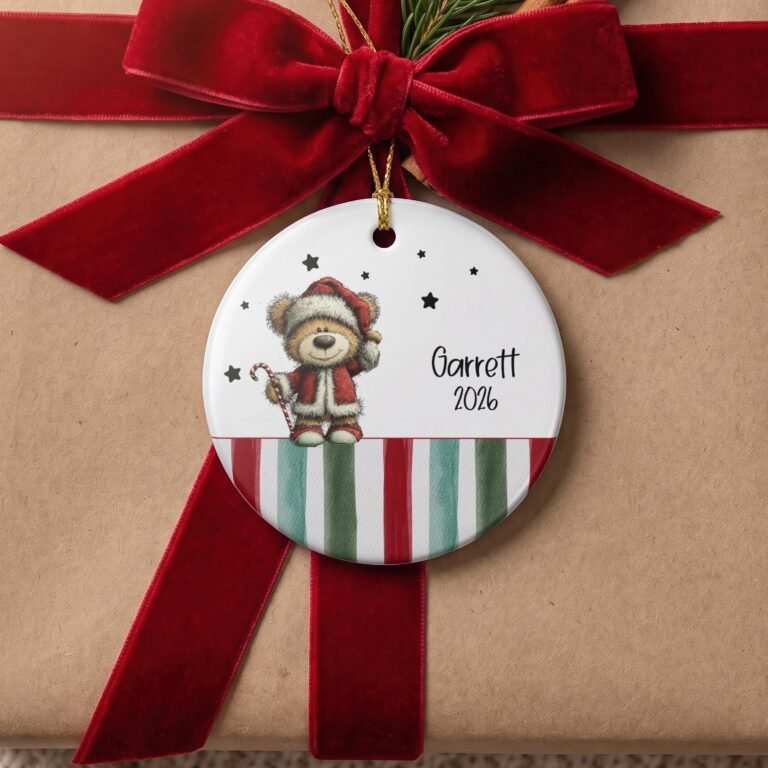 Personalized ceramic ornament with a teddy bear in a Santa hat holding a candy cane